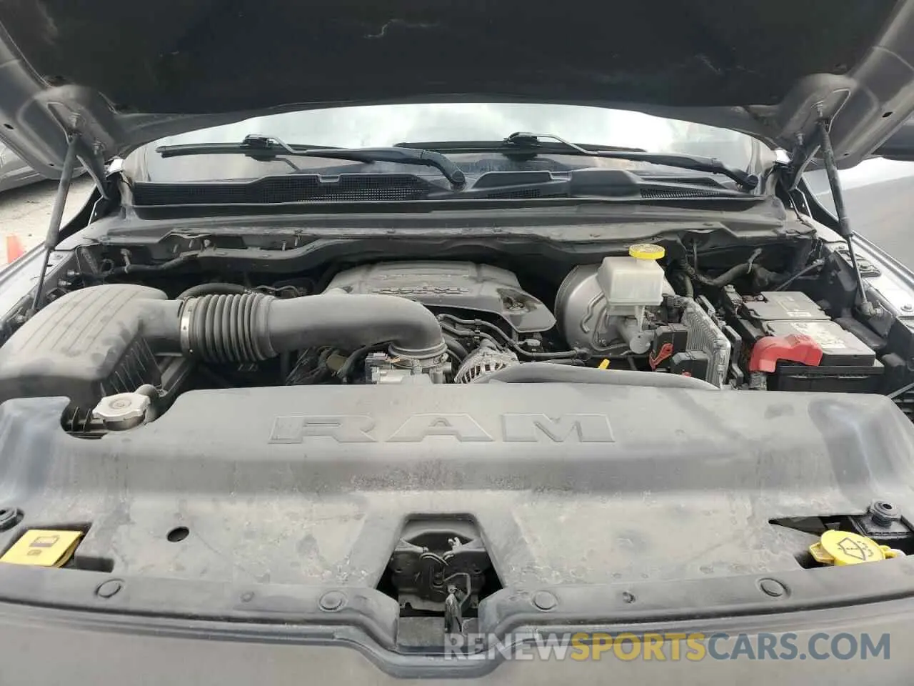 11 Photograph of a damaged car 1C6SRFET1KN875363 RAM 1500 2019