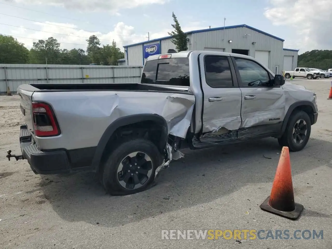 3 Photograph of a damaged car 1C6SRFET1KN875363 RAM 1500 2019