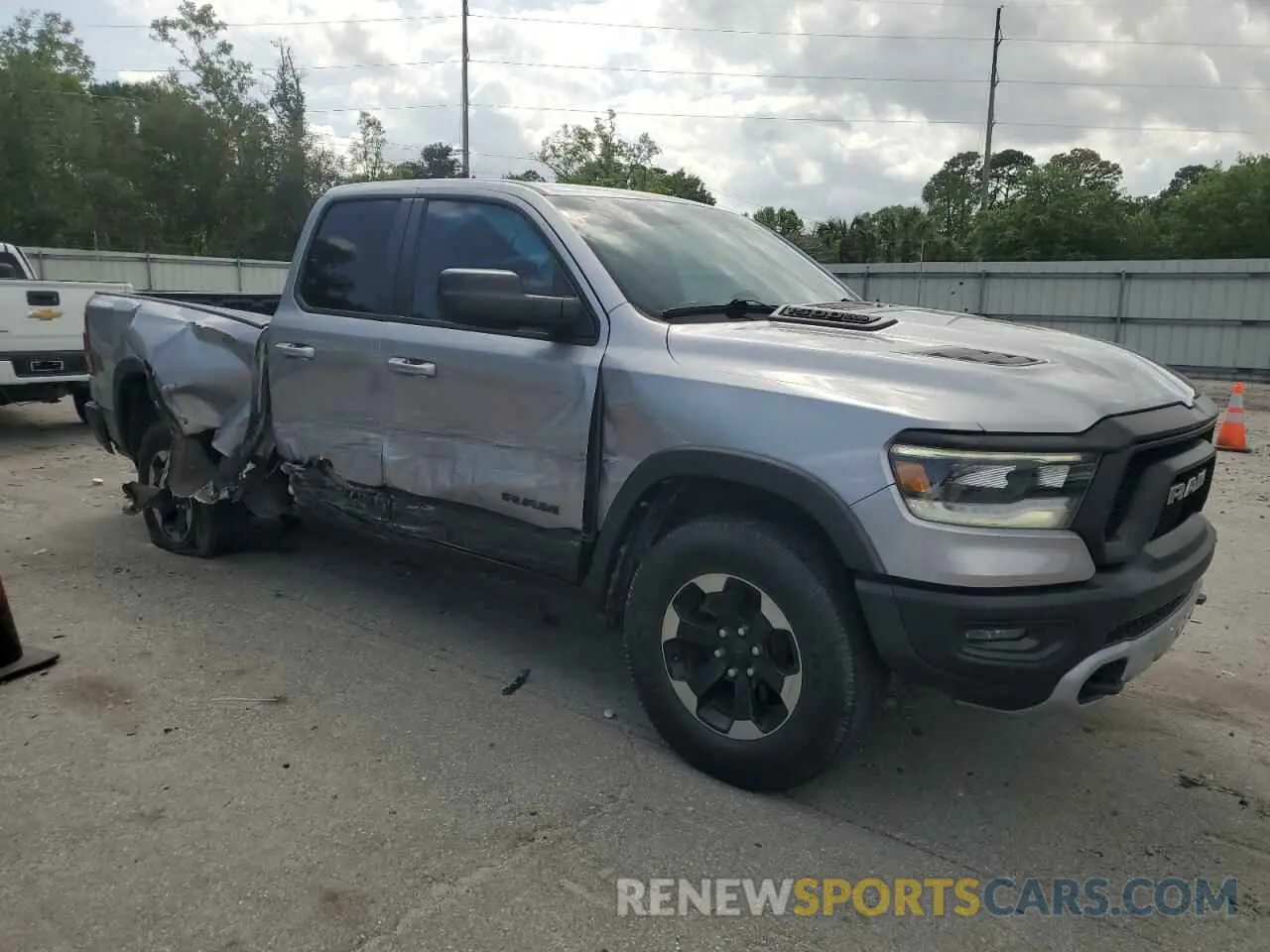 4 Photograph of a damaged car 1C6SRFET1KN875363 RAM 1500 2019
