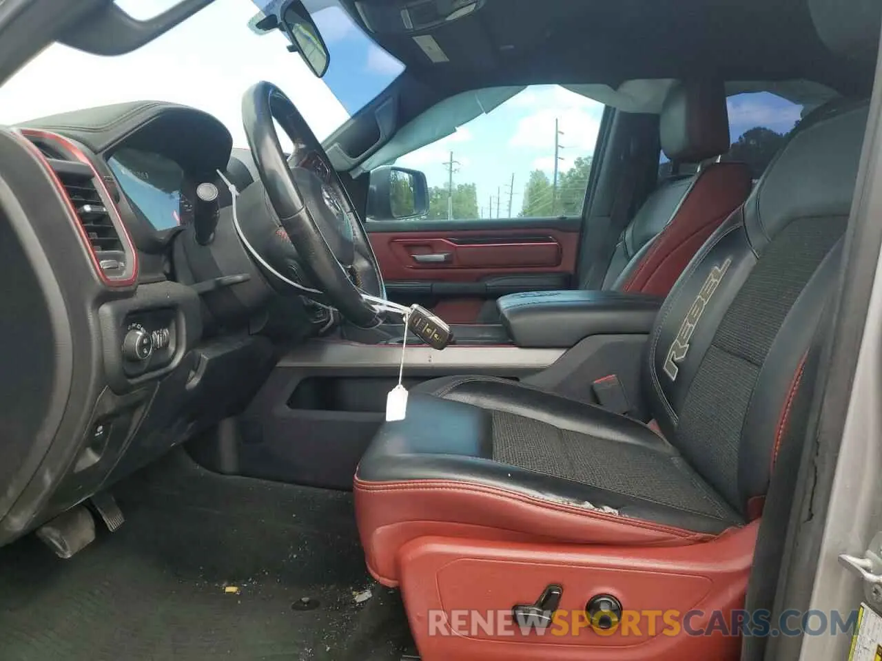 7 Photograph of a damaged car 1C6SRFET1KN875363 RAM 1500 2019