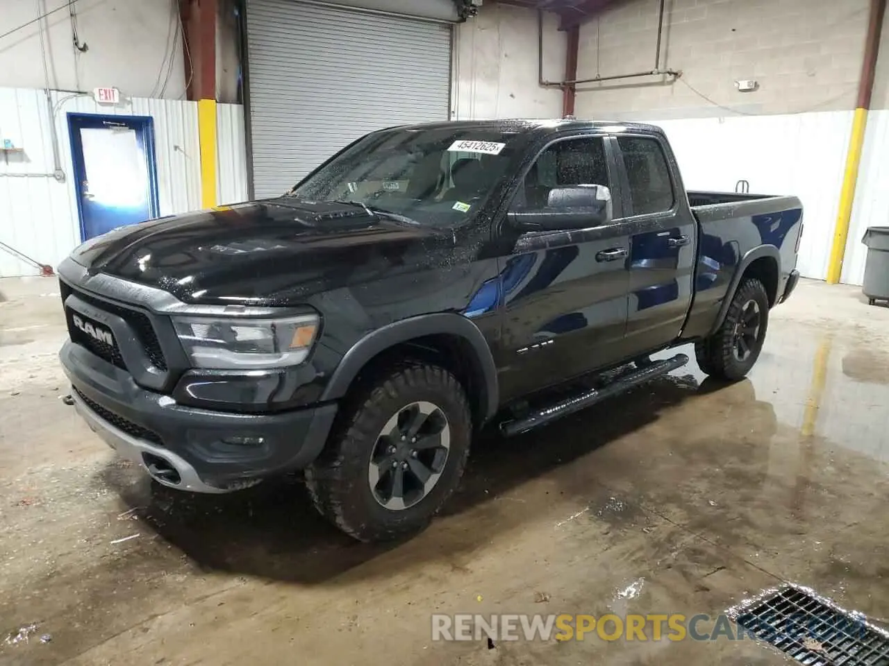1 Photograph of a damaged car 1C6SRFET2KN546915 RAM 1500 2019