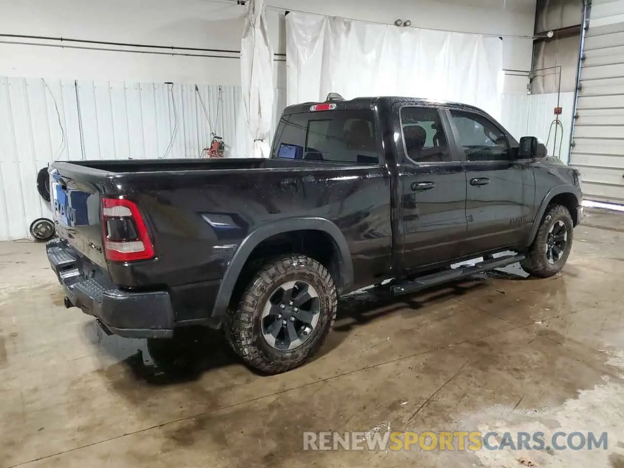 3 Photograph of a damaged car 1C6SRFET2KN546915 RAM 1500 2019