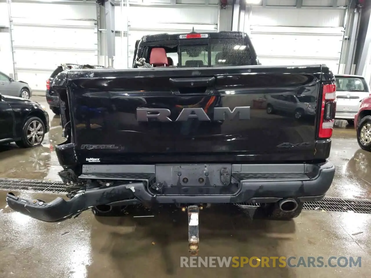 6 Photograph of a damaged car 1C6SRFET2KN565965 RAM 1500 2019