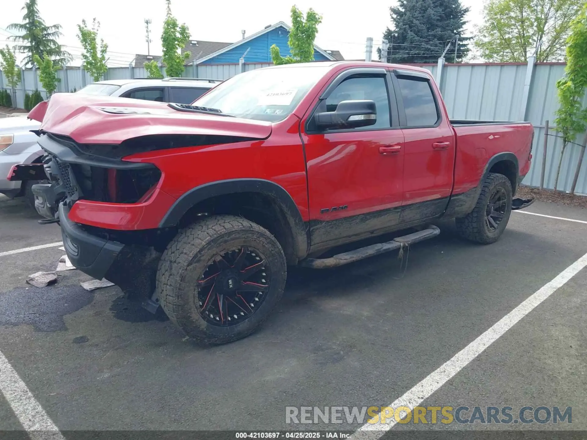 2 Photograph of a damaged car 1C6SRFET2KN599078 RAM 1500 2019