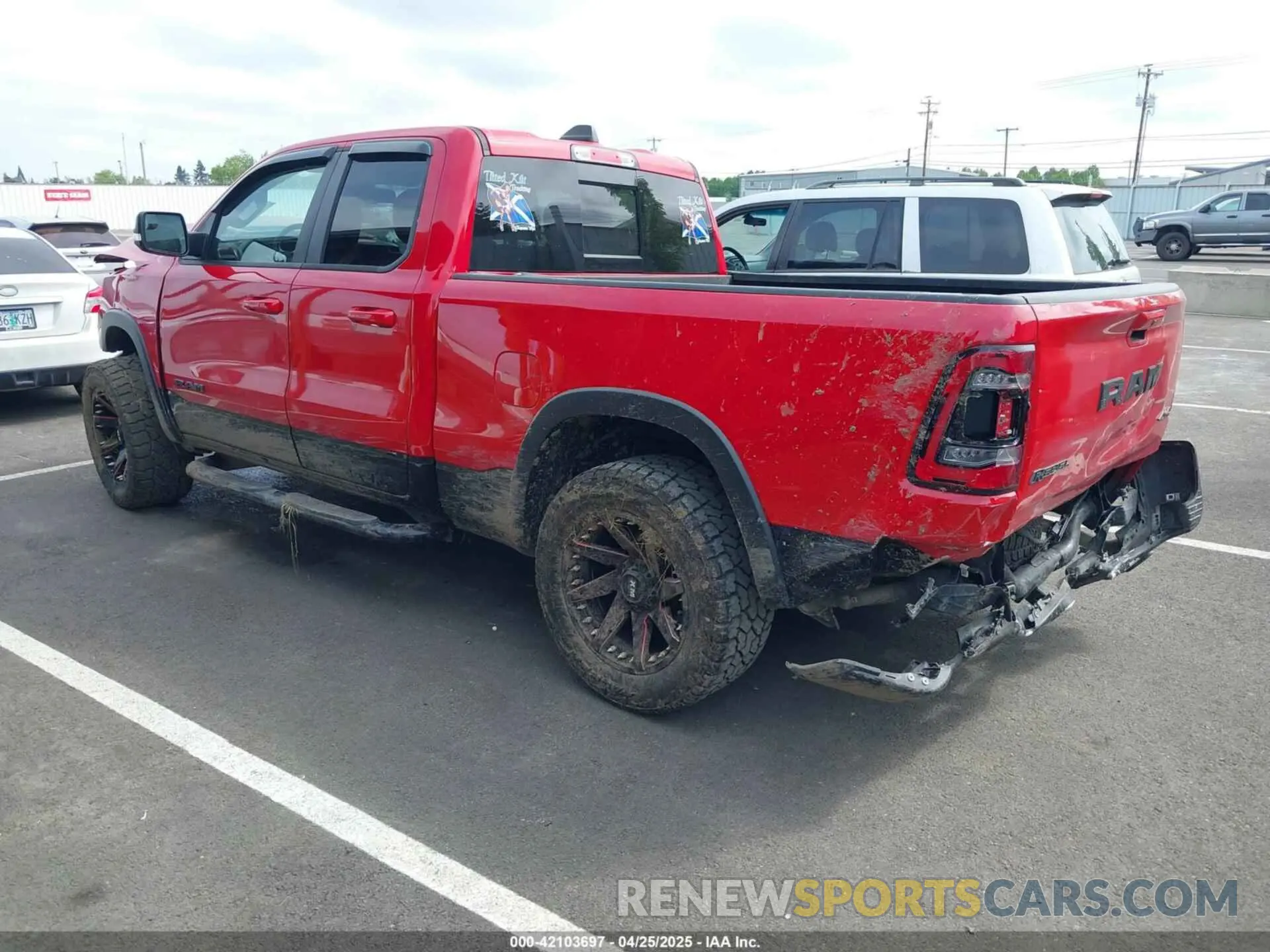 3 Photograph of a damaged car 1C6SRFET2KN599078 RAM 1500 2019