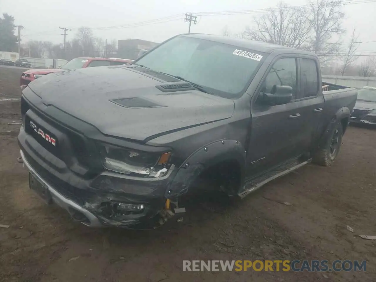 1 Photograph of a damaged car 1C6SRFET2KN848737 RAM 1500 2019