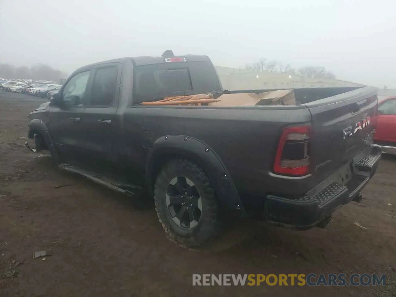 2 Photograph of a damaged car 1C6SRFET2KN848737 RAM 1500 2019