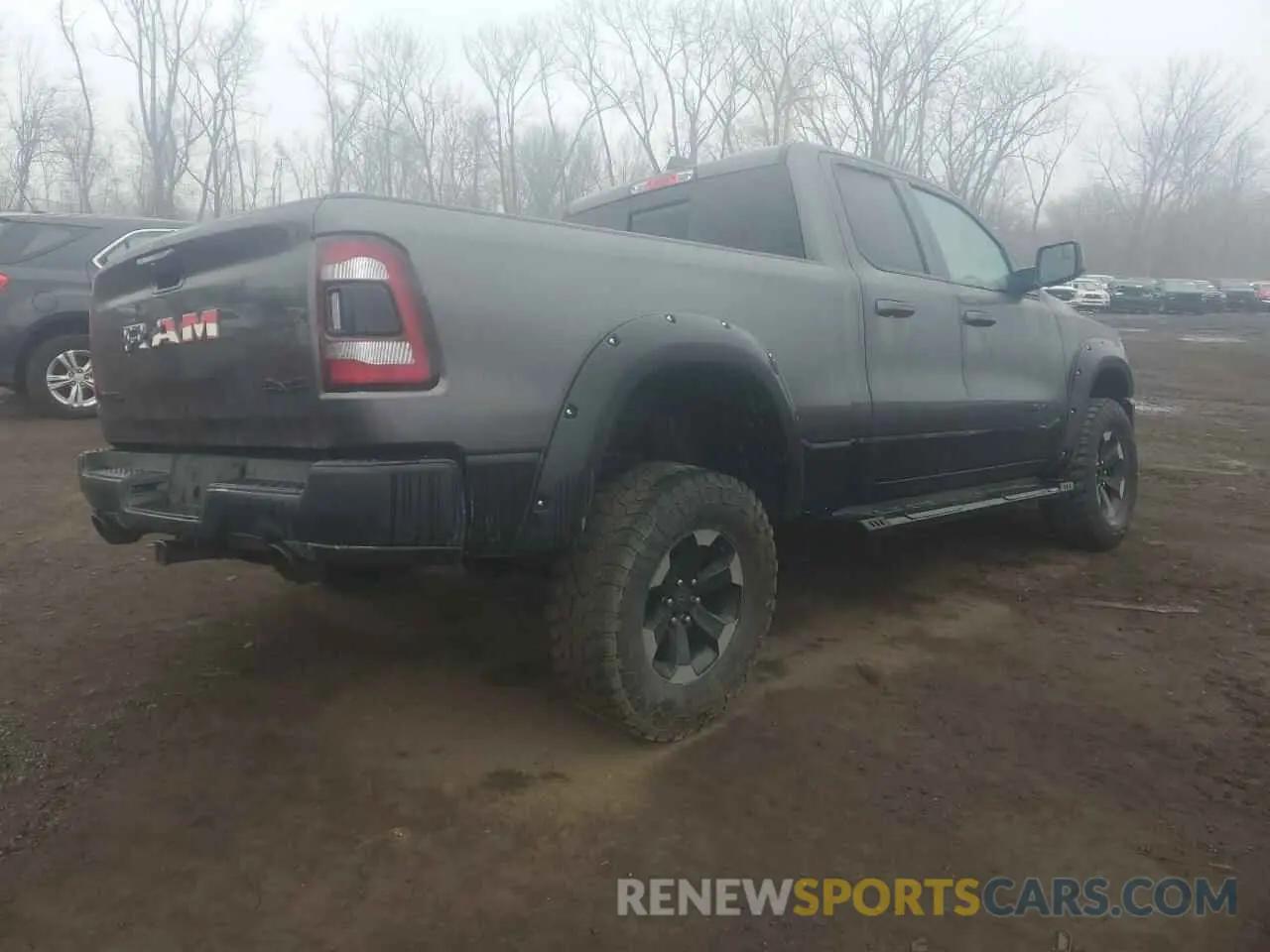 3 Photograph of a damaged car 1C6SRFET2KN848737 RAM 1500 2019