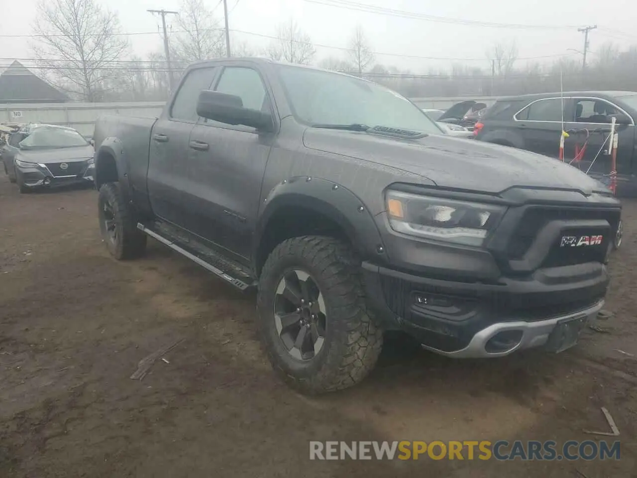 4 Photograph of a damaged car 1C6SRFET2KN848737 RAM 1500 2019
