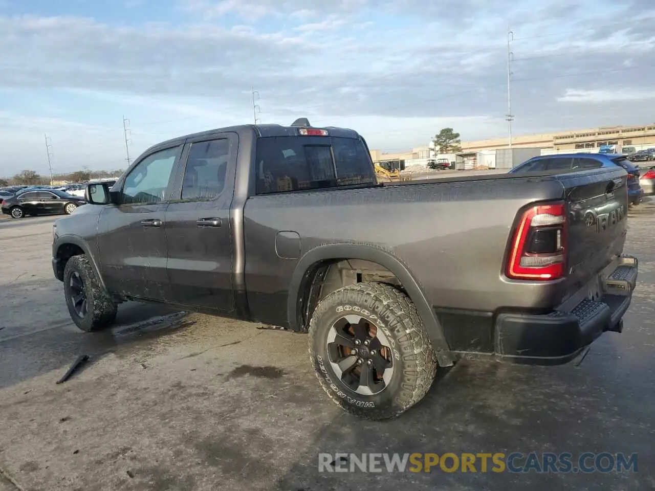 2 Photograph of a damaged car 1C6SRFET4KN577695 RAM 1500 2019