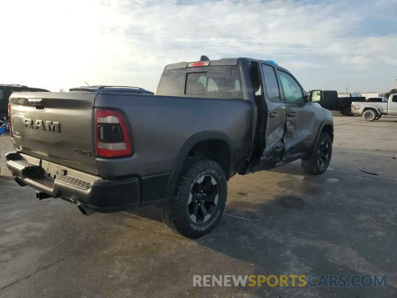3 Photograph of a damaged car 1C6SRFET4KN577695 RAM 1500 2019