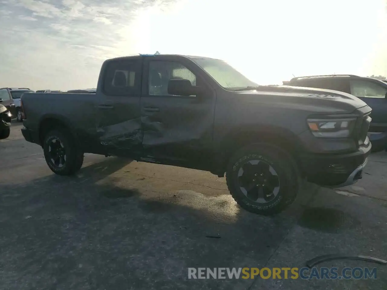 4 Photograph of a damaged car 1C6SRFET4KN577695 RAM 1500 2019