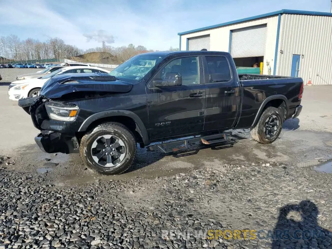 1 Photograph of a damaged car 1C6SRFET5KN580766 RAM 1500 2019