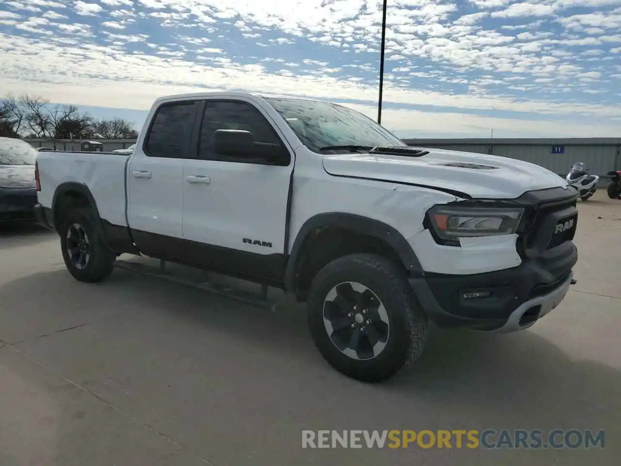 4 Photograph of a damaged car 1C6SRFET6KN841001 RAM 1500 2019