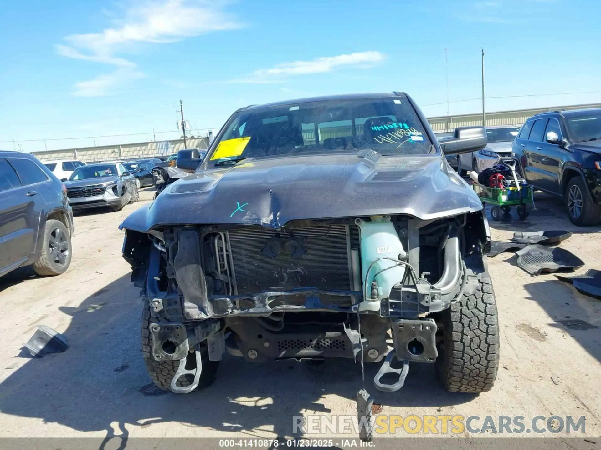 13 Photograph of a damaged car 1C6SRFET7KN861046 RAM 1500 2019