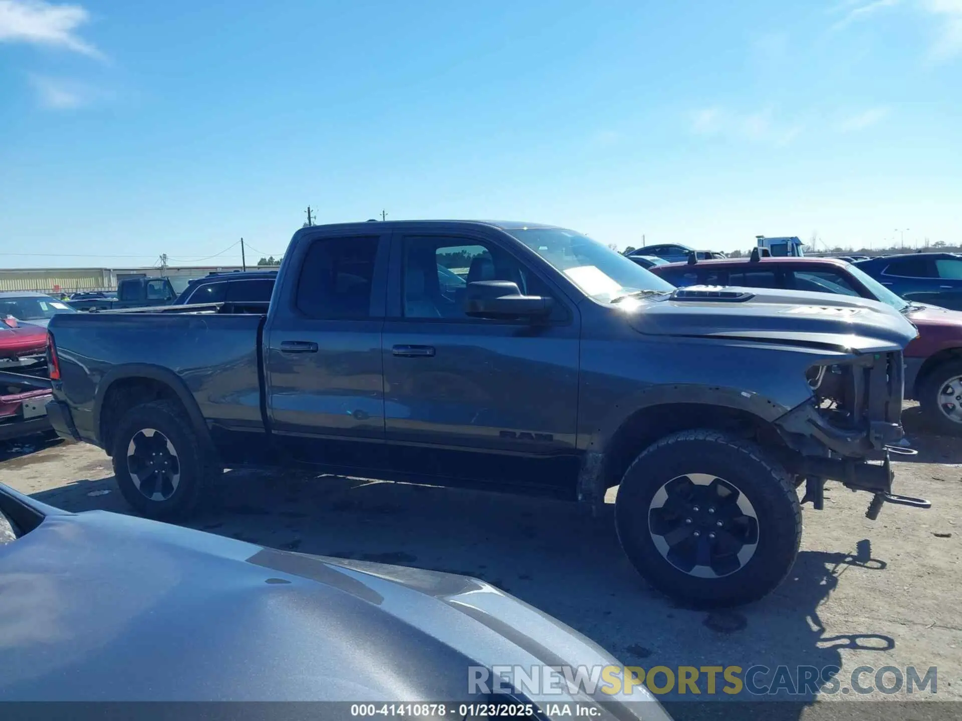 14 Photograph of a damaged car 1C6SRFET7KN861046 RAM 1500 2019