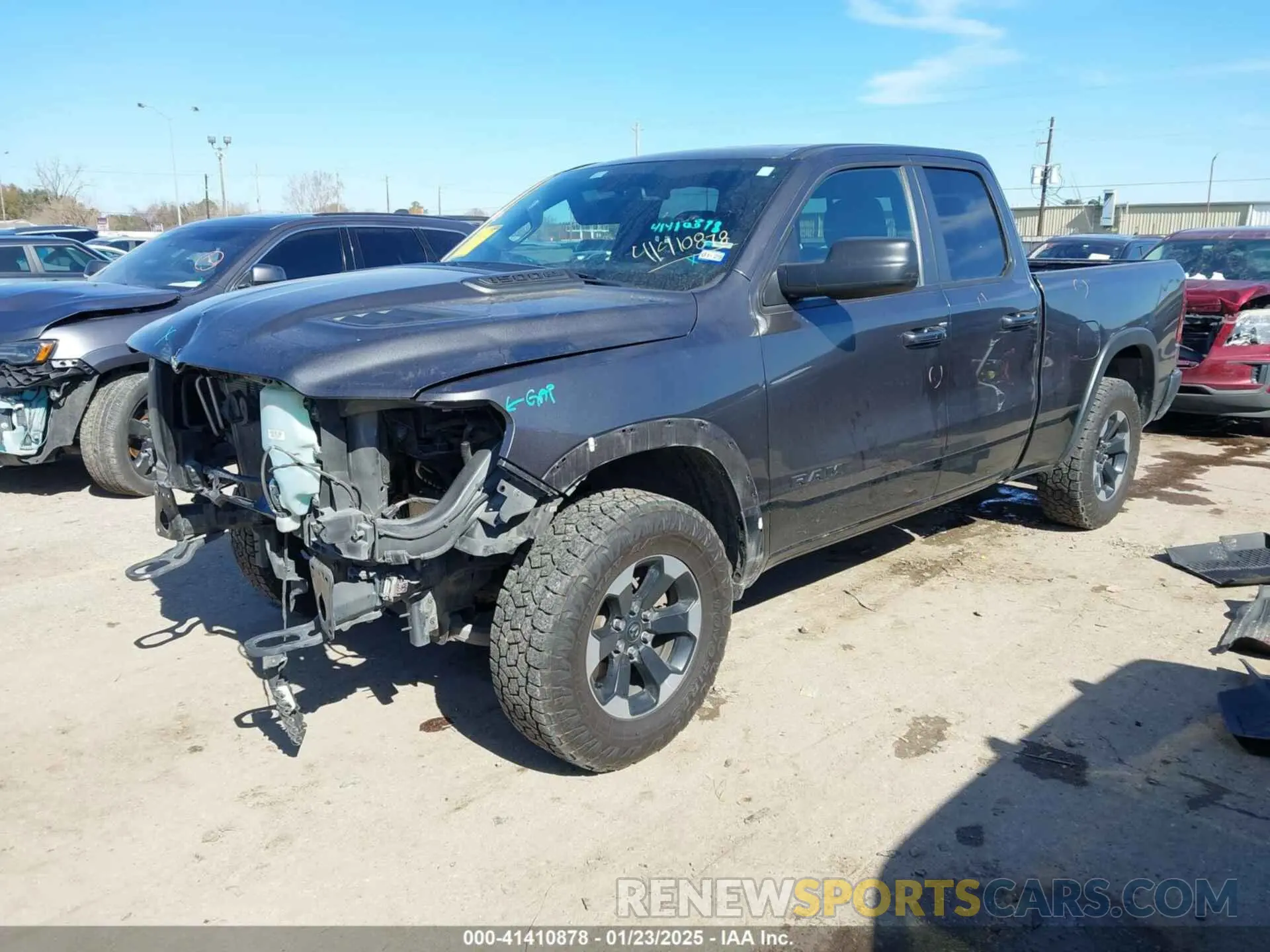 2 Photograph of a damaged car 1C6SRFET7KN861046 RAM 1500 2019