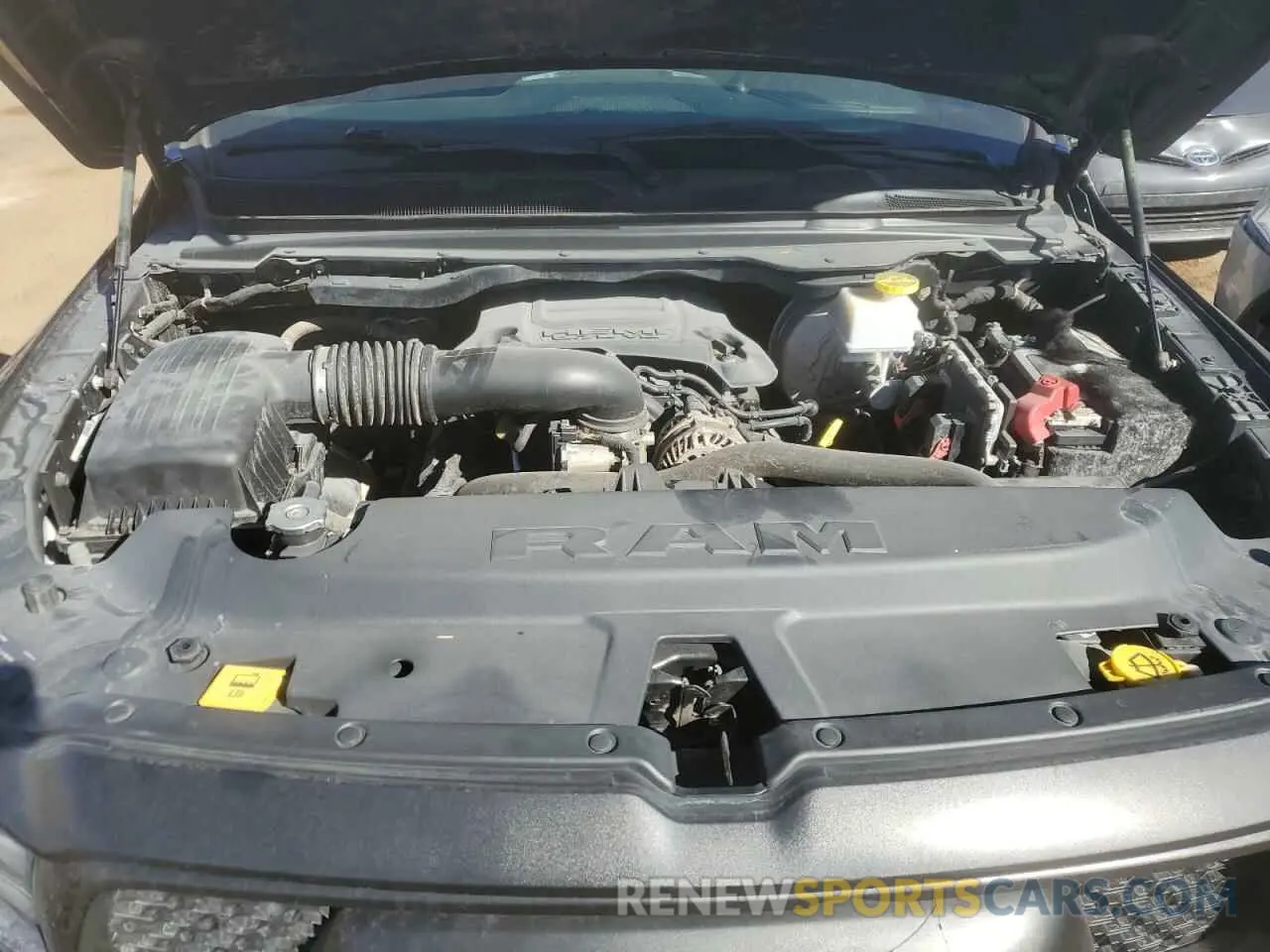 11 Photograph of a damaged car 1C6SRFET7KN865176 RAM 1500 2019