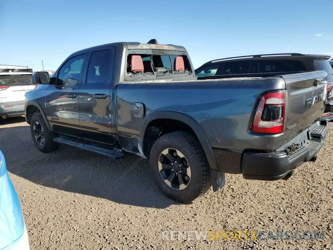 2 Photograph of a damaged car 1C6SRFET7KN865176 RAM 1500 2019