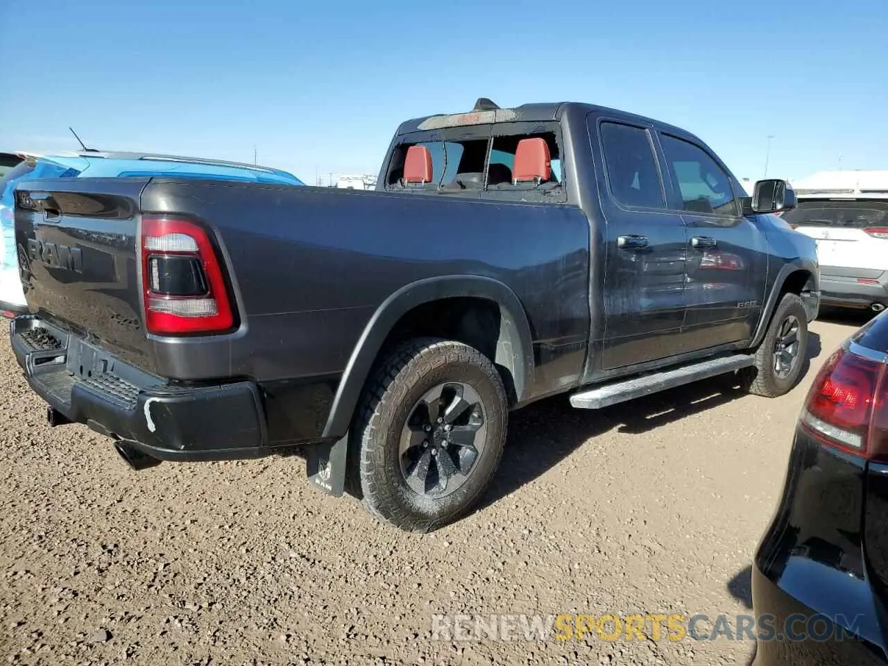 3 Photograph of a damaged car 1C6SRFET7KN865176 RAM 1500 2019