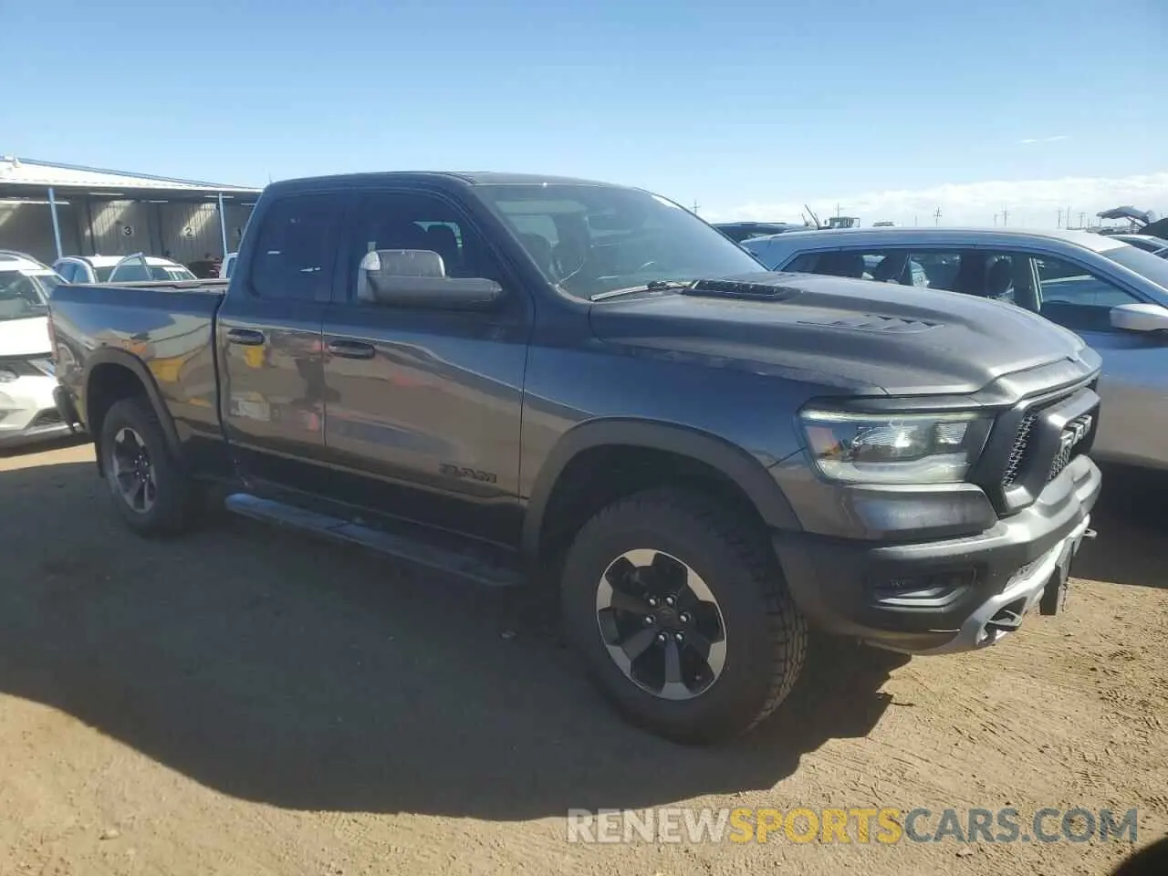 4 Photograph of a damaged car 1C6SRFET7KN865176 RAM 1500 2019