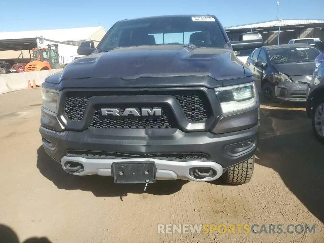 5 Photograph of a damaged car 1C6SRFET7KN865176 RAM 1500 2019