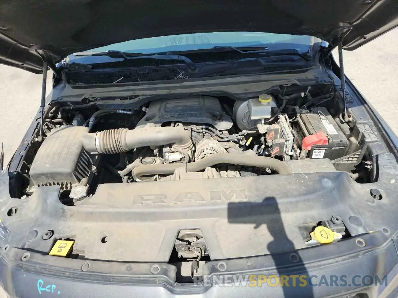 11 Photograph of a damaged car 1C6SRFET7KN875819 RAM 1500 2019