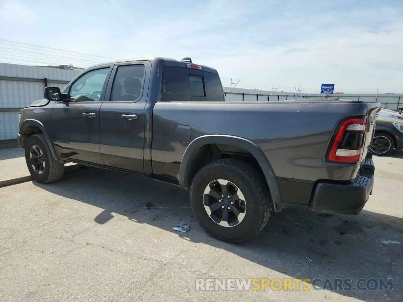 2 Photograph of a damaged car 1C6SRFET7KN875819 RAM 1500 2019
