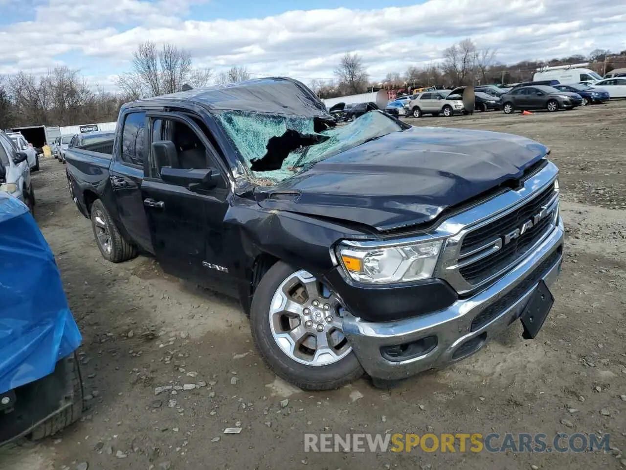 4 Photograph of a damaged car 1C6SRFFT0KN532414 RAM 1500 2019