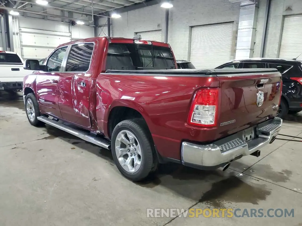 2 Photograph of a damaged car 1C6SRFFT0KN586554 RAM 1500 2019
