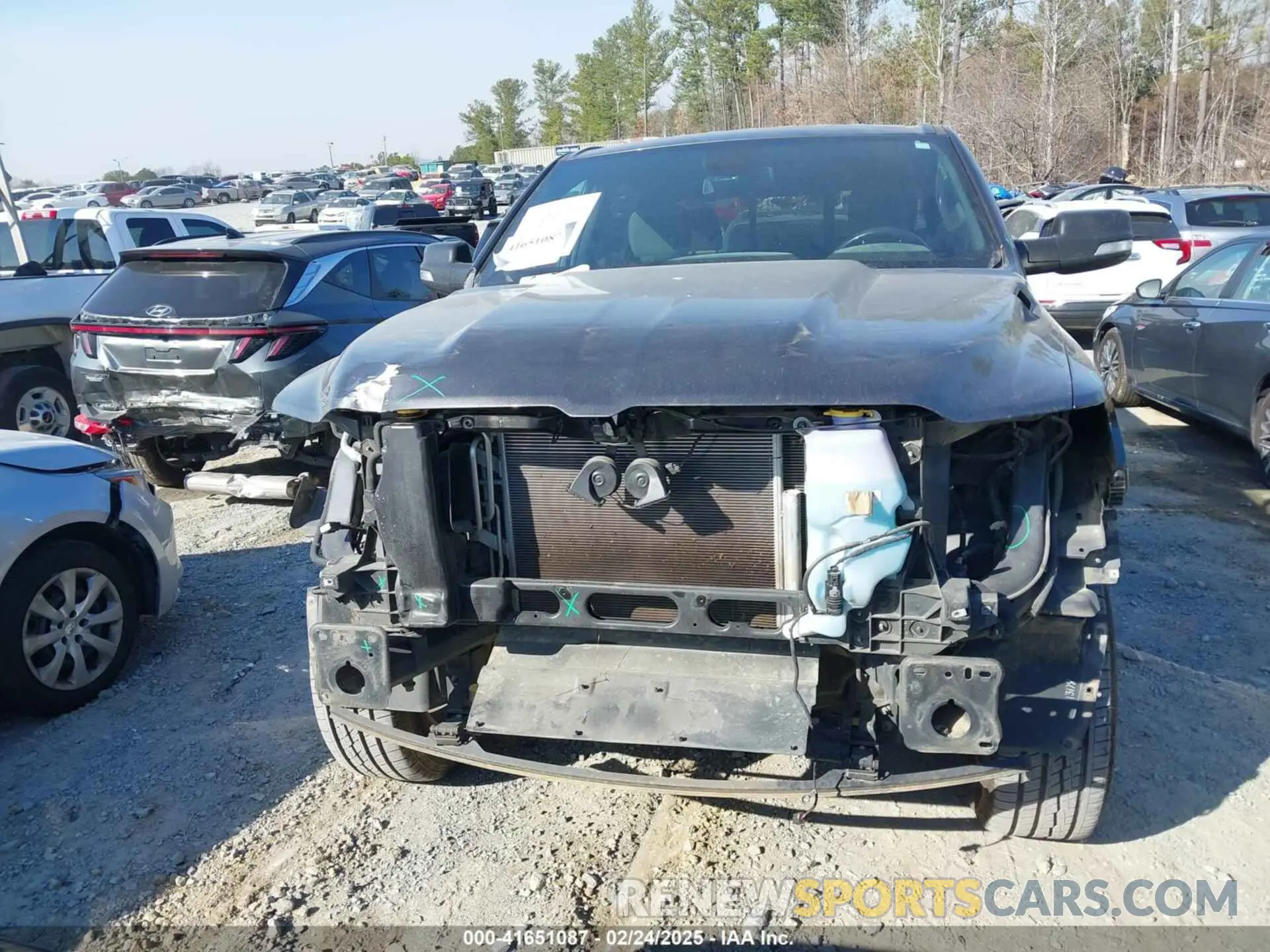 12 Photograph of a damaged car 1C6SRFFT0KN627457 RAM 1500 2019