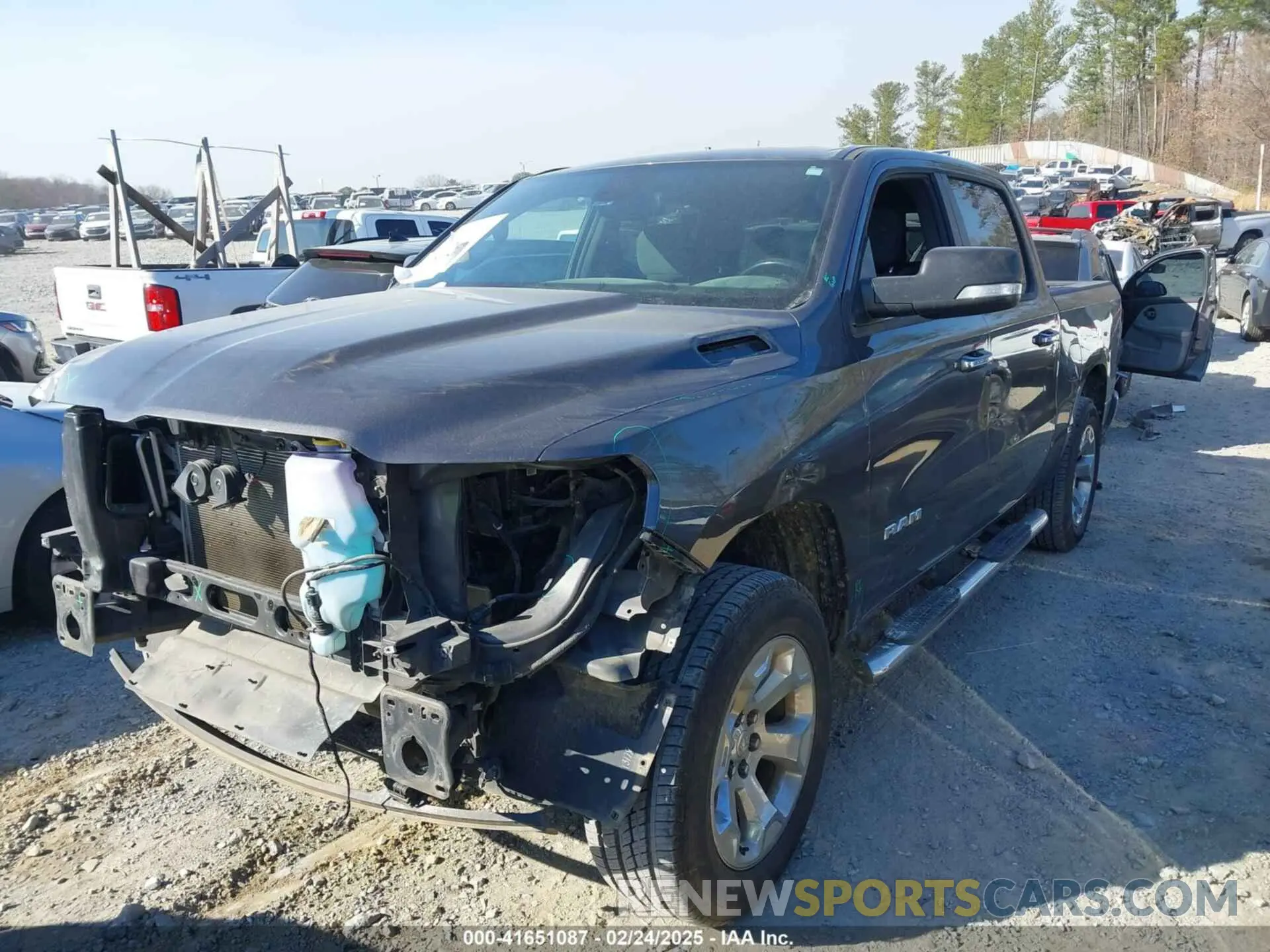 2 Photograph of a damaged car 1C6SRFFT0KN627457 RAM 1500 2019