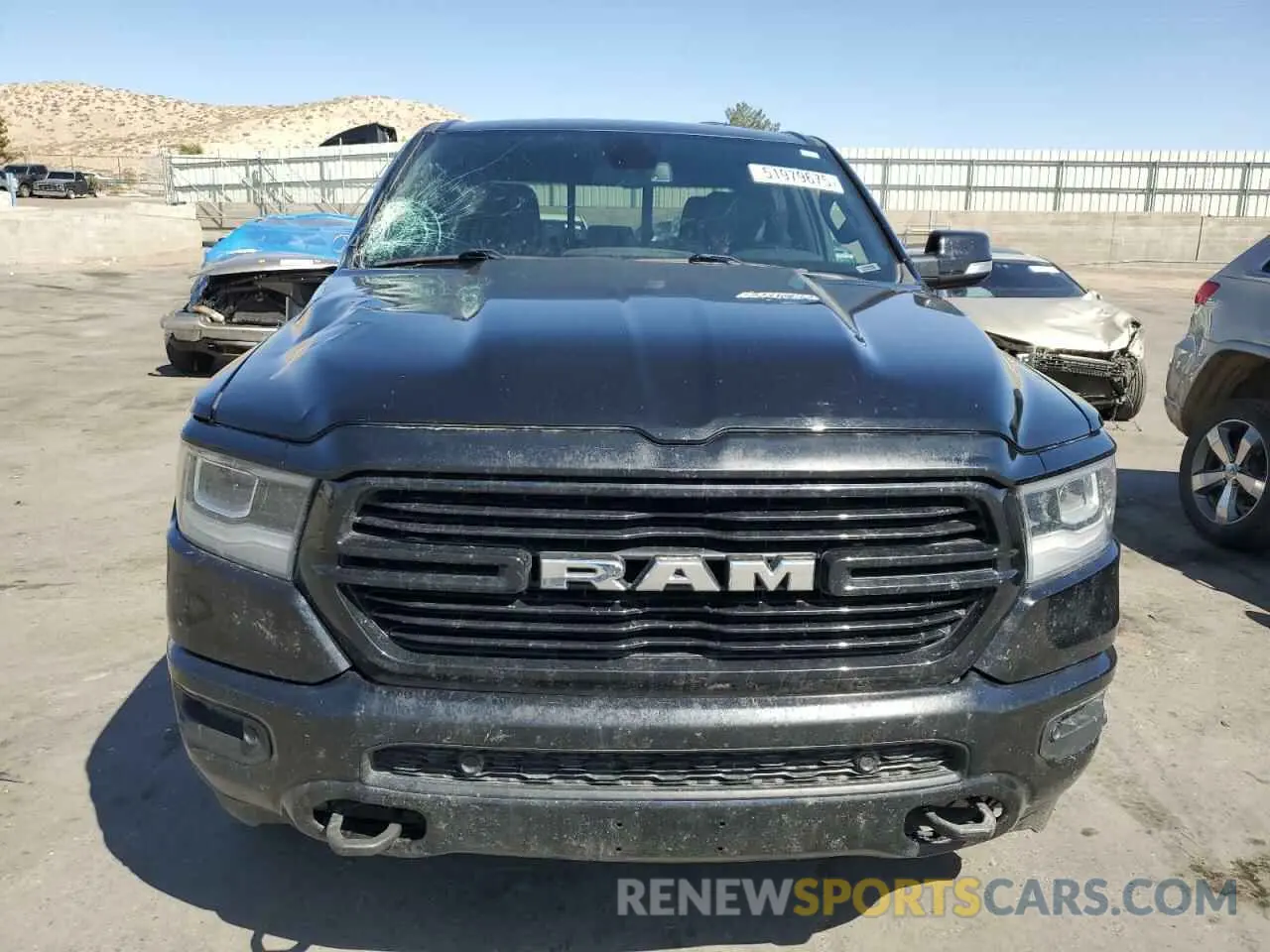 5 Photograph of a damaged car 1C6SRFFT0KN713965 RAM 1500 2019