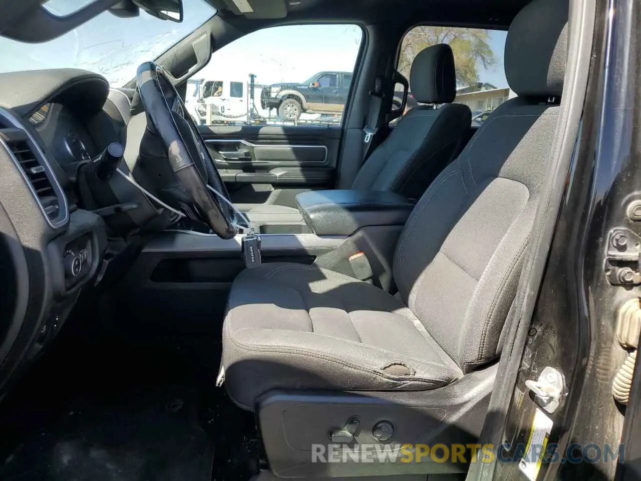 7 Photograph of a damaged car 1C6SRFFT0KN713965 RAM 1500 2019