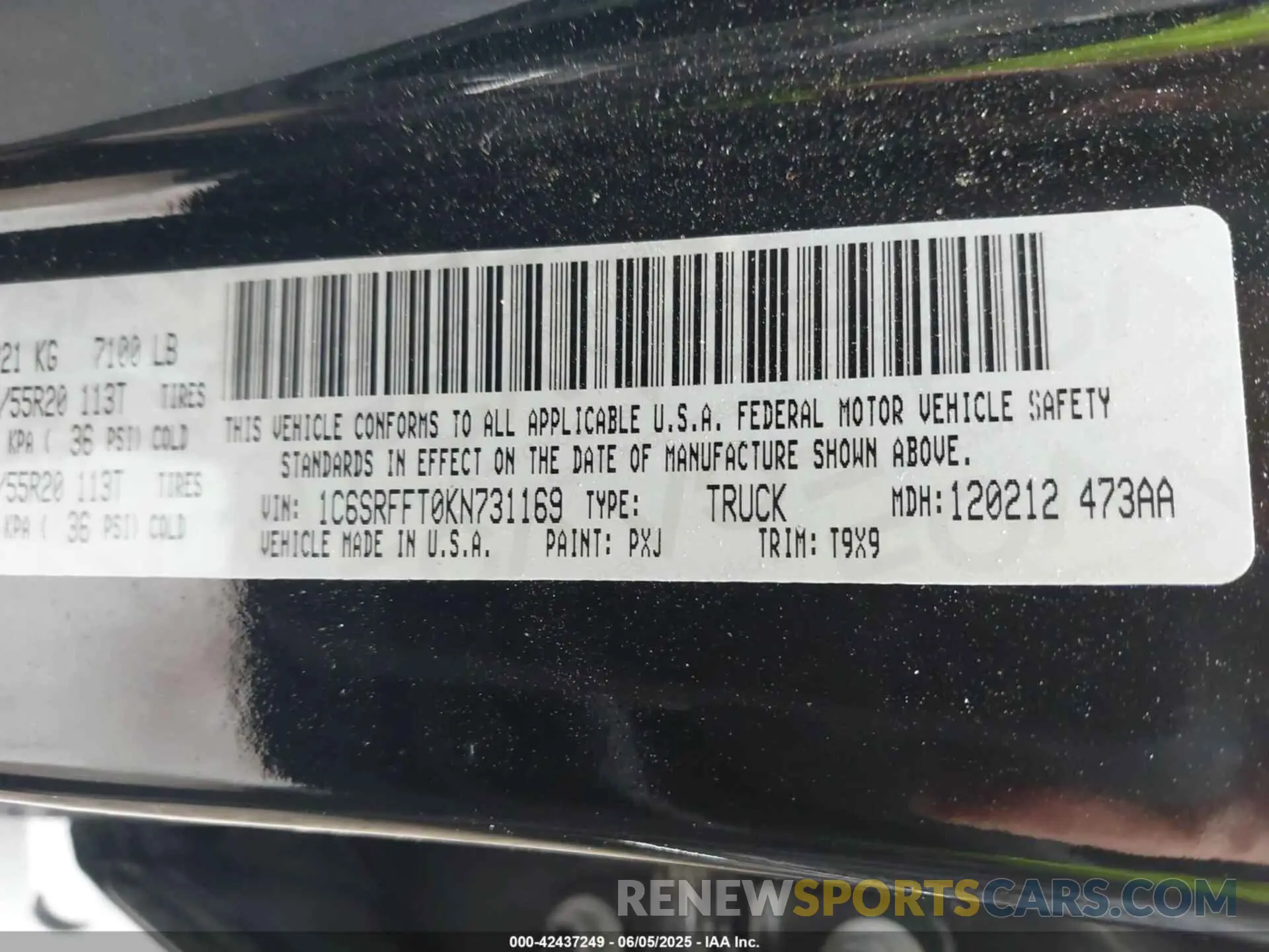 9 Photograph of a damaged car 1C6SRFFT0KN731169 RAM 1500 2019
