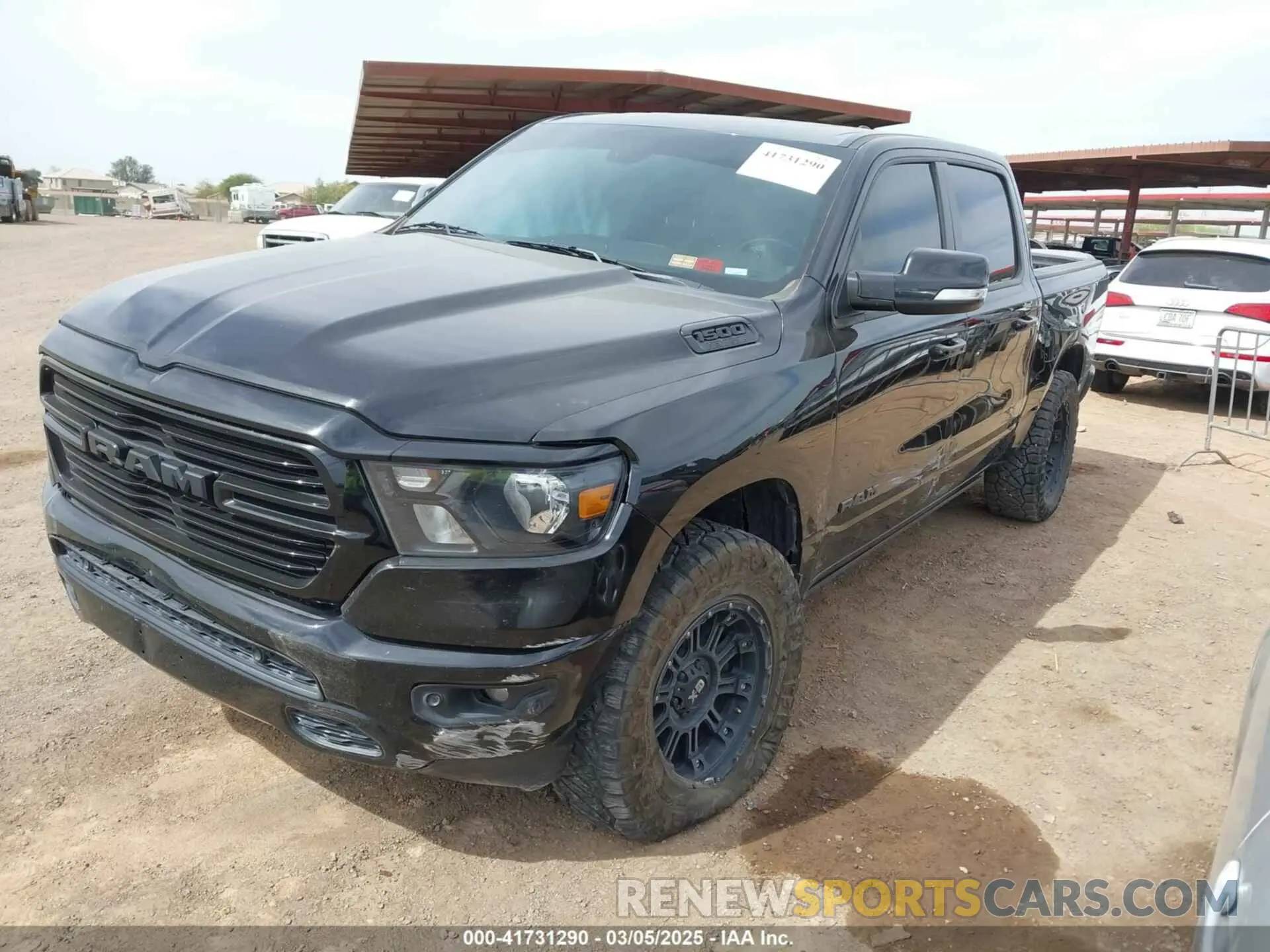 2 Photograph of a damaged car 1C6SRFFT0KN751969 RAM 1500 2019