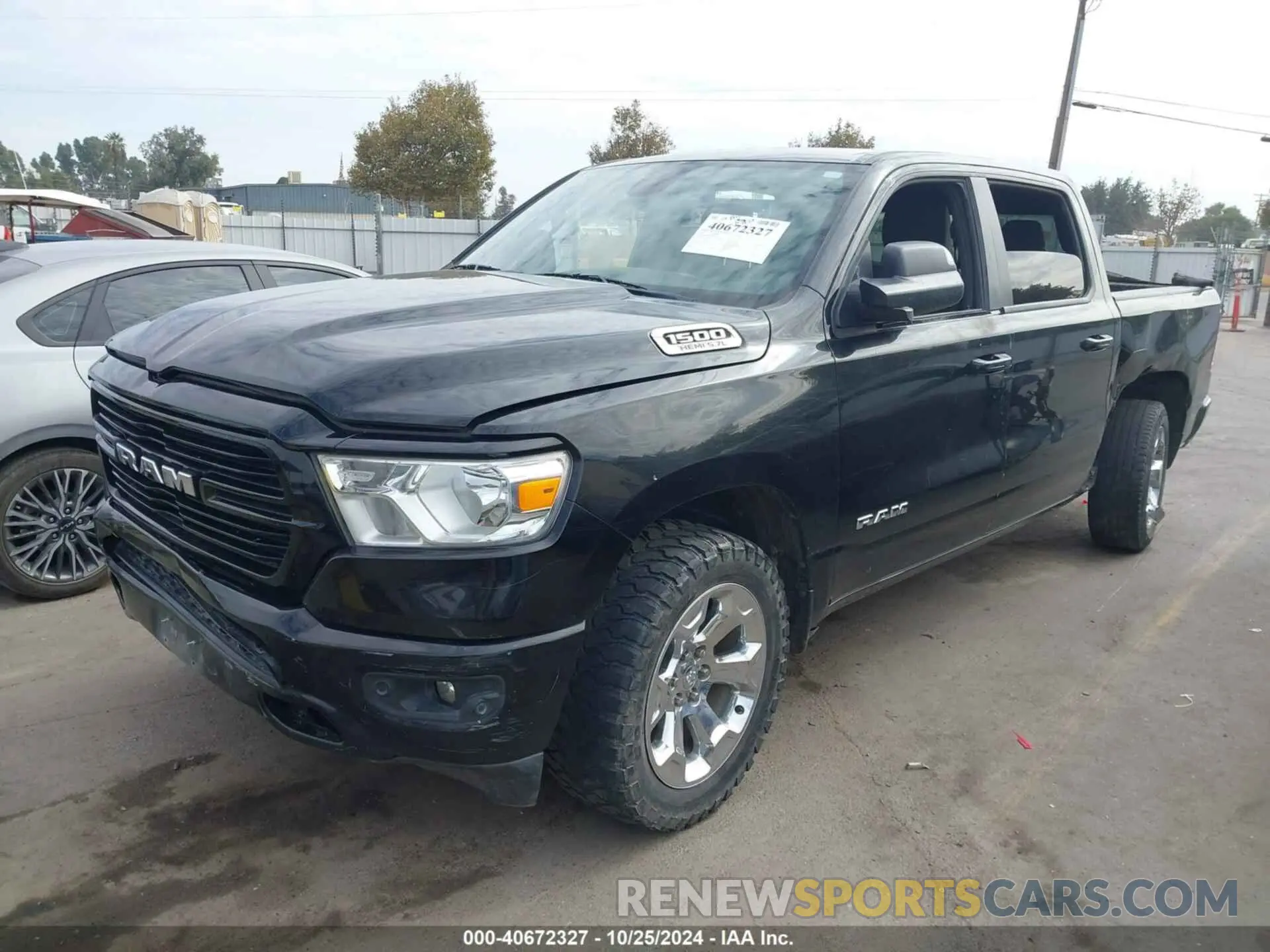 2 Photograph of a damaged car 1C6SRFFT0KN804461 RAM 1500 2019
