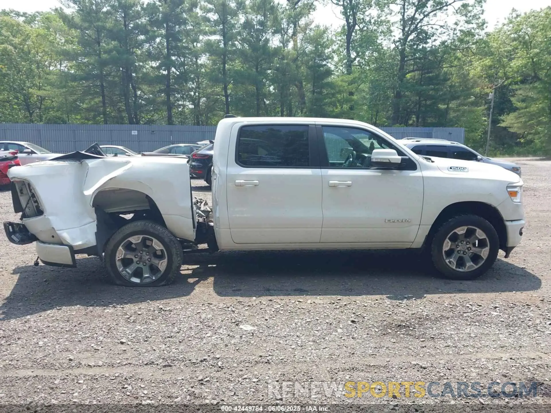 13 Photograph of a damaged car 1C6SRFFT0KN823513 RAM 1500 2019