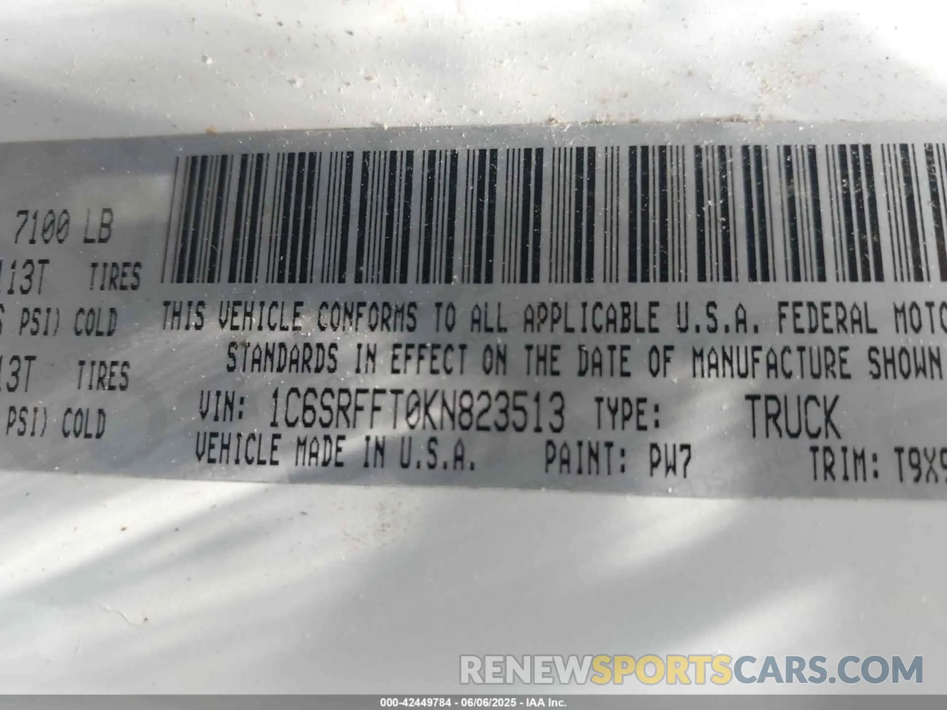 9 Photograph of a damaged car 1C6SRFFT0KN823513 RAM 1500 2019