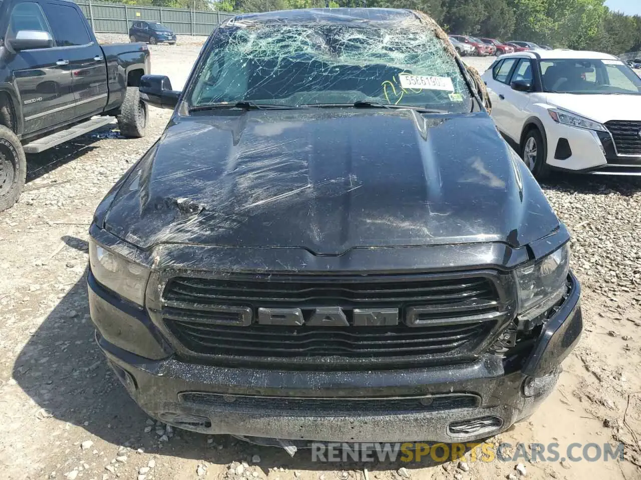 11 Photograph of a damaged car 1C6SRFFT0KN870198 RAM 1500 2019