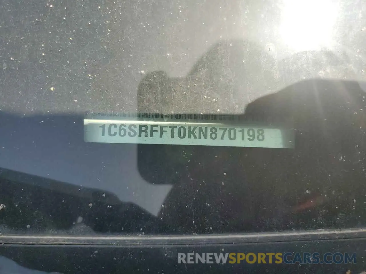 12 Photograph of a damaged car 1C6SRFFT0KN870198 RAM 1500 2019