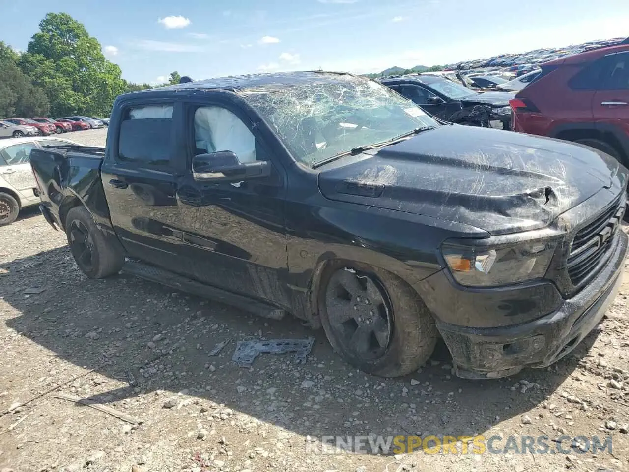 4 Photograph of a damaged car 1C6SRFFT0KN870198 RAM 1500 2019