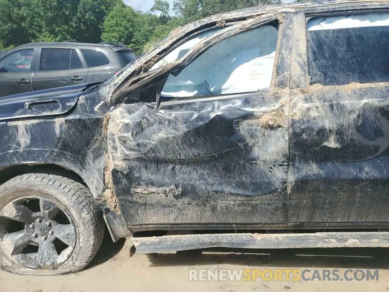 7 Photograph of a damaged car 1C6SRFFT0KN870198 RAM 1500 2019
