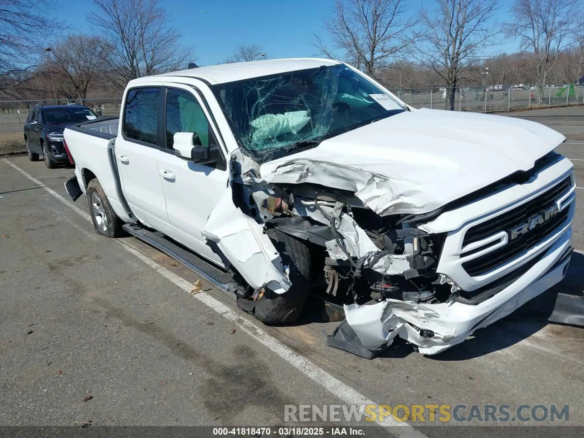 1 Photograph of a damaged car 1C6SRFFT1KN585106 RAM 1500 2019