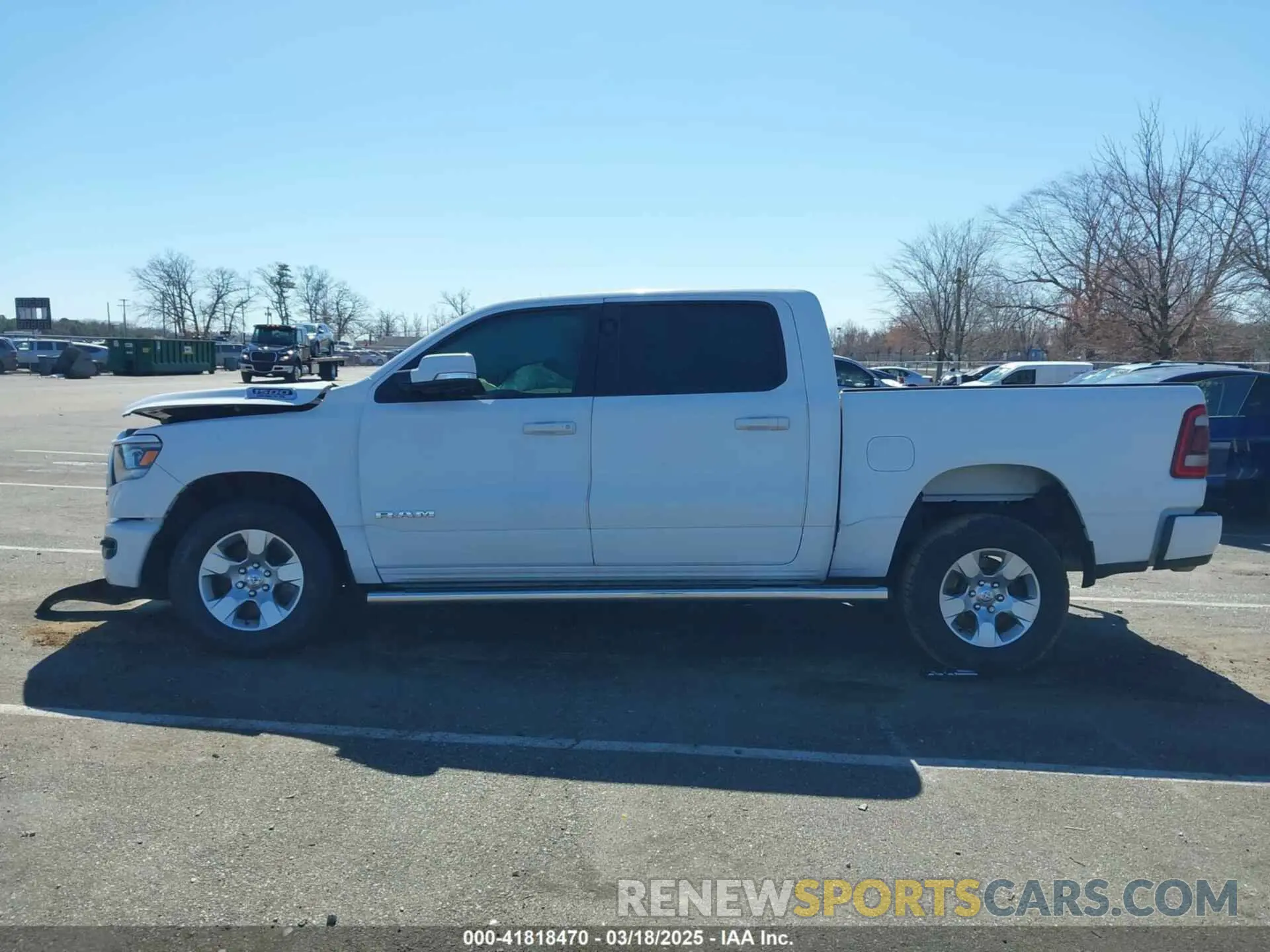 14 Photograph of a damaged car 1C6SRFFT1KN585106 RAM 1500 2019