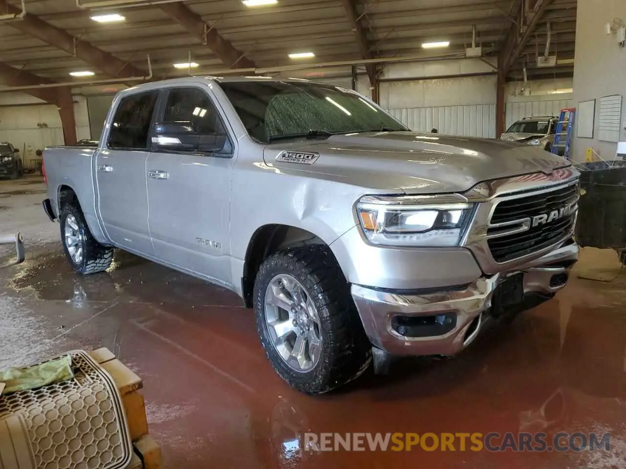 4 Photograph of a damaged car 1C6SRFFT1KN603121 RAM 1500 2019