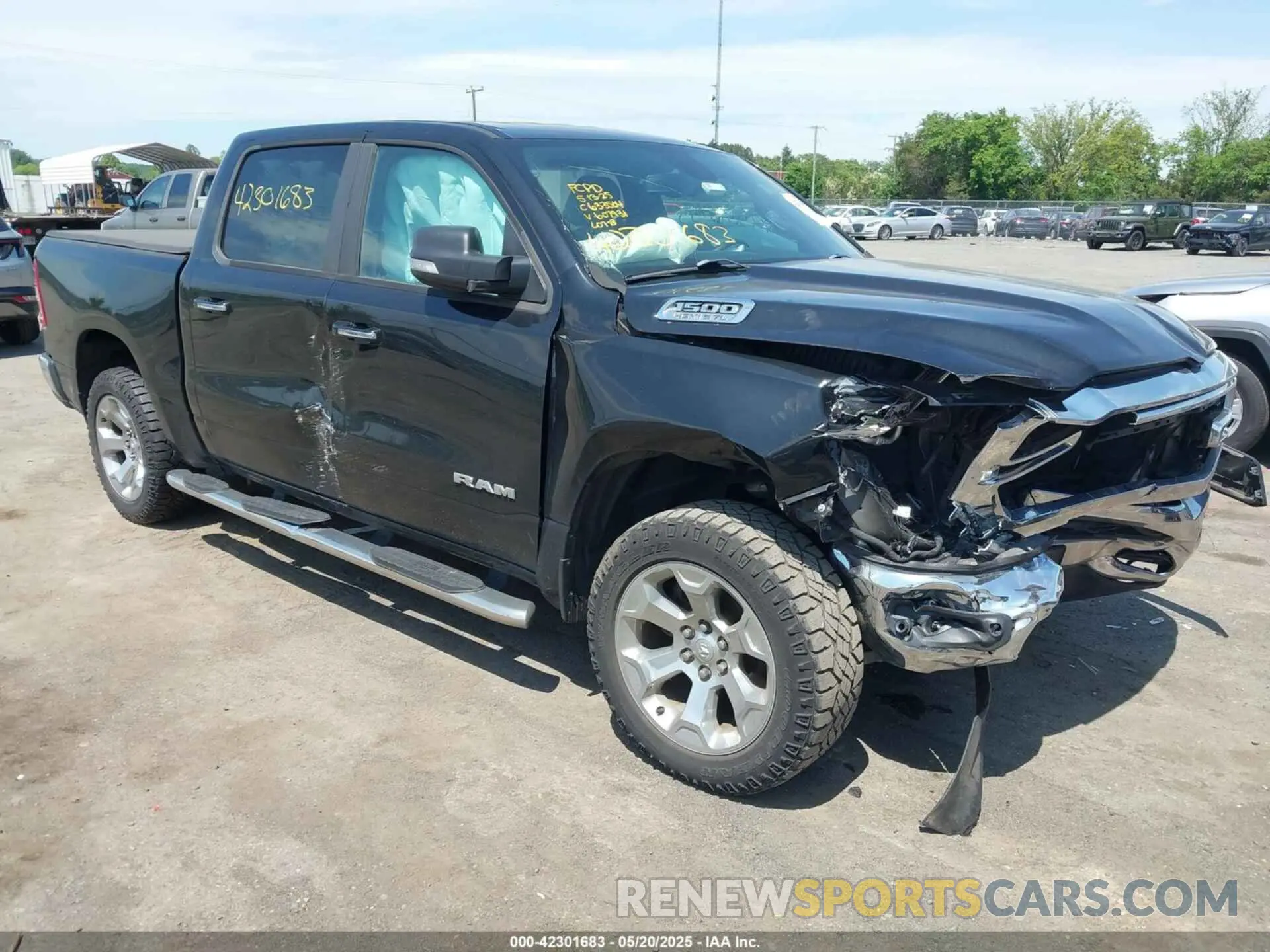 1 Photograph of a damaged car 1C6SRFFT1KN607931 RAM 1500 2019