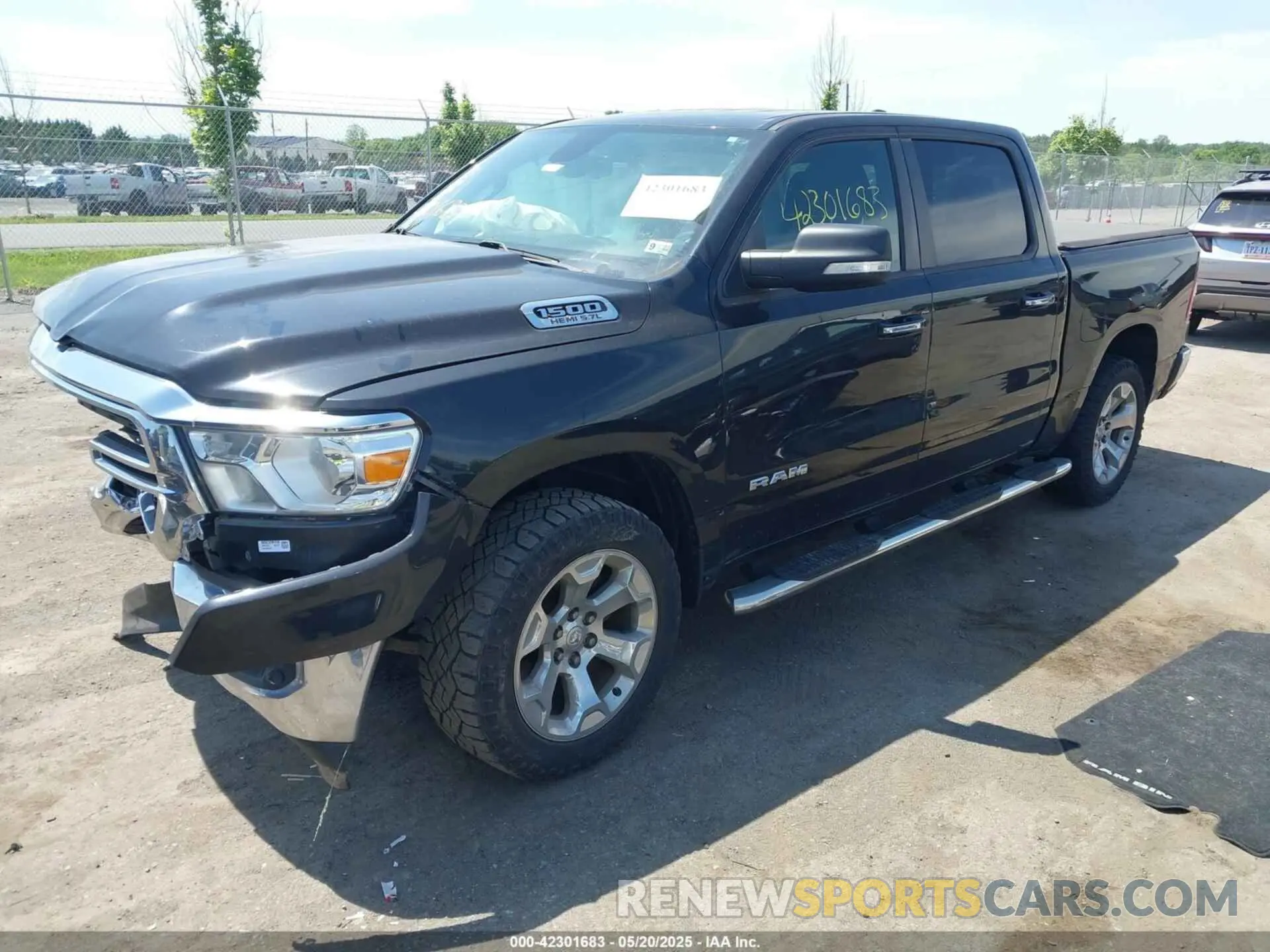 2 Photograph of a damaged car 1C6SRFFT1KN607931 RAM 1500 2019