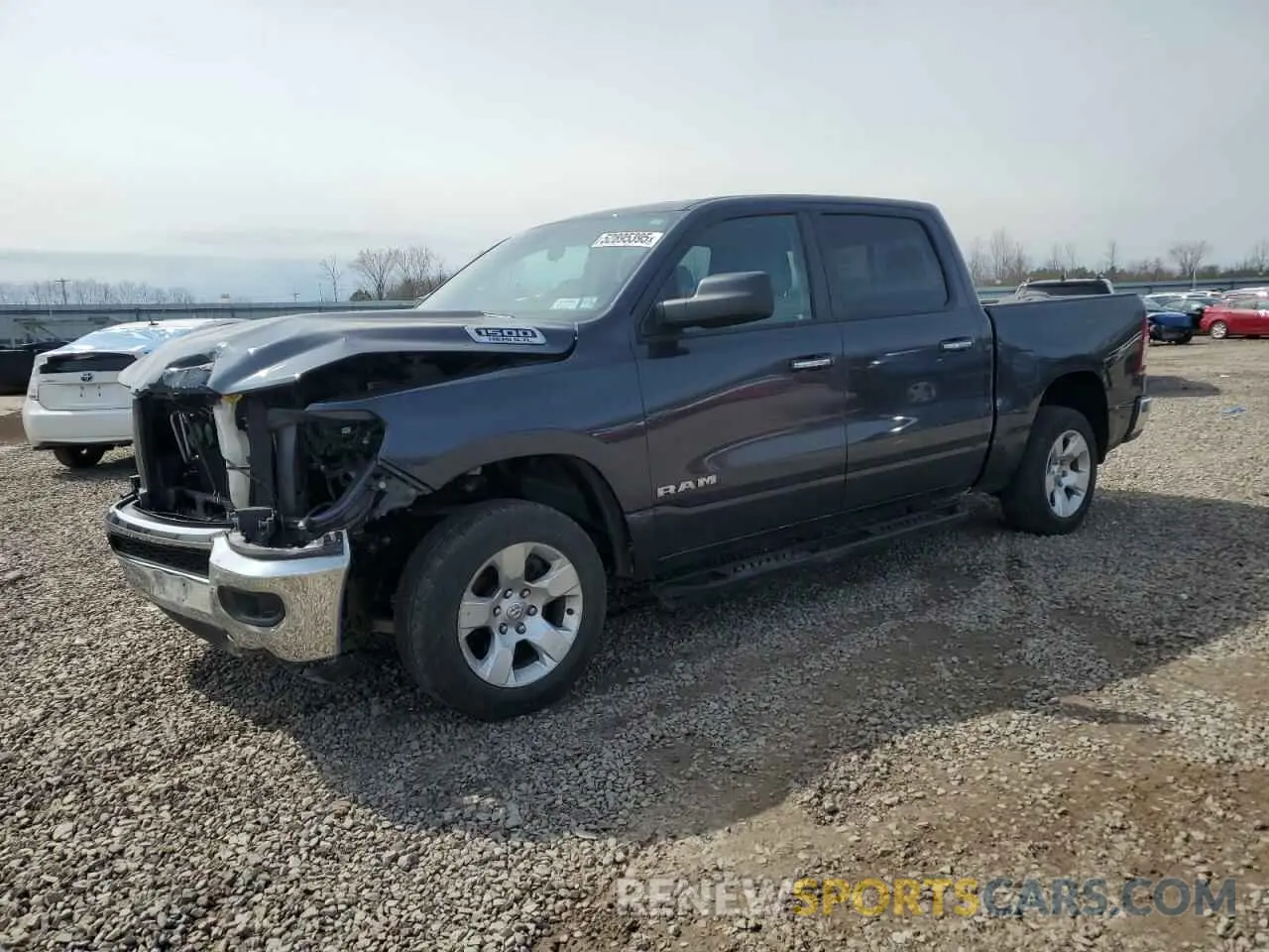 1 Photograph of a damaged car 1C6SRFFT1KN621098 RAM 1500 2019