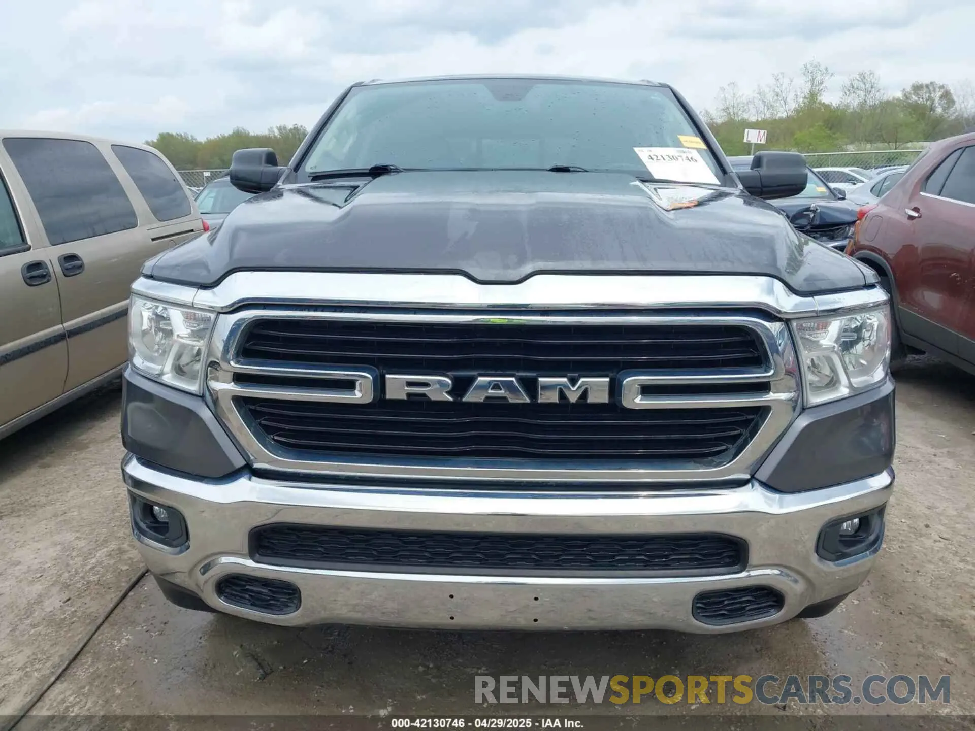 12 Photograph of a damaged car 1C6SRFFT1KN645322 RAM 1500 2019